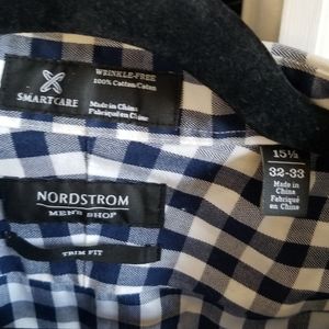Two Nordstrom long sleeve button up shirts.